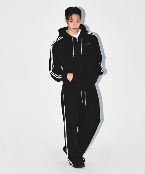 BORN TO WIN（ボーントゥウィン）の「CHROME B TRACK LINE SEMI WIDE PANTS [BLACK]（スウェットパンツ・メンズ・その他・1/2/3）」の6枚目の写真
