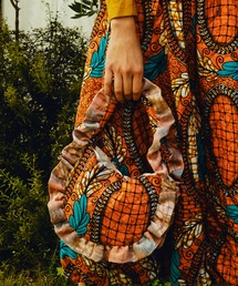 moyan ecri（モヤン エクリ）の「<moyan ecri>アフリカンファブリックフリルミニBAG（ハンドバッグ）」