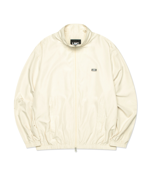 LMCの「IDEAL TRACK JACKET ivory(ナイロンジャケット・レディース・その他・MEDIUM/SMALL/X-LARGE/LARGE)」の1枚目の写真