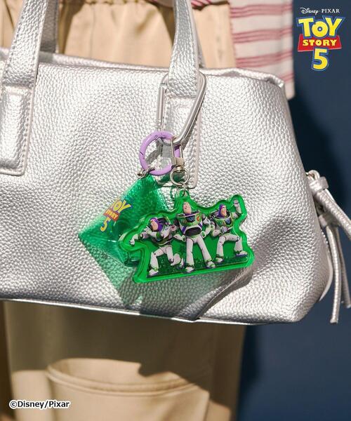 Disney(ディズニー)の「【TOY STORY 5】ポーチ付きシャカシャカチャーム(コインケース・レディース・グリーン/ブルー/ピンク/イエロー・FREE)」の8枚目の写真