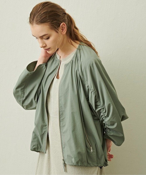 green drawstring jacket