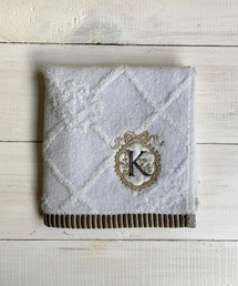 nicott（ニコット）の「NC:フラワーイニシャルタオルハンカチ（ハンカチ/ハンドタオル）」