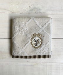 nicott（ニコット）の「NC:フラワーイニシャルタオルハンカチ（ハンカチ/ハンドタオル）」