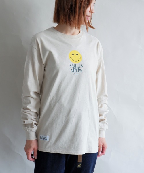 MANASTASH(マナスタッシュ)の「MANASTASH/マナスタッシュ W's LEAF SMILE L/S TEE ウィメンズ リーフスマイル ロンT(Tシャツ/カットソー・レディース・ホワイト/サンドベージュ/ブラック・MEDIUM)」の1枚目の写真