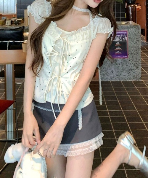Emilie(エミリー)の「ドット柄 レイヤード風 リボン 半袖トップス チョーカー付き(Tシャツ/カットソー・レディース・アイボリー・FREE)」の10枚目の写真