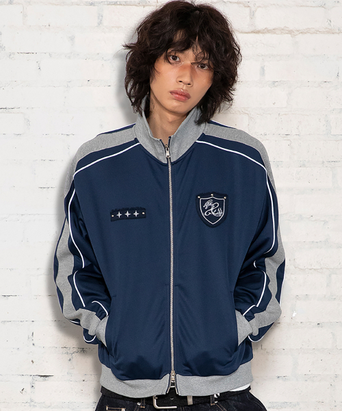 XTONZ(エクストーンズ)の「XJ140 スリムフィット アプリケ パイピング トラック ジップアップ (NAVY)(ナイロンジャケット・レディース・その他・MEDIUM/LARGE)」の1枚目の写真
