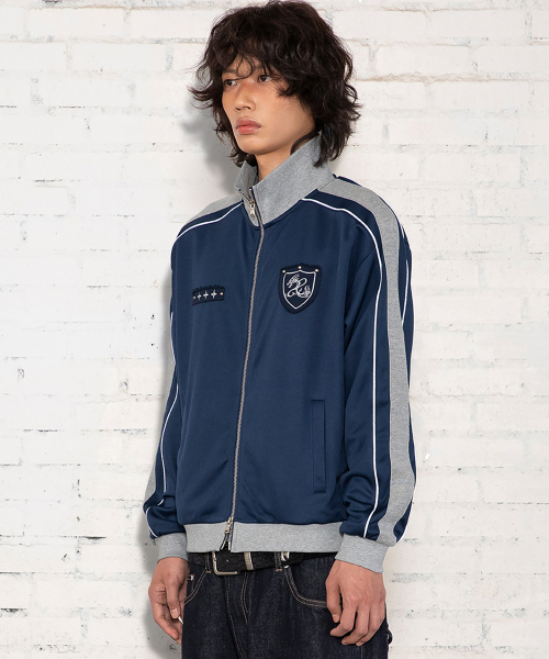 XTONZ(エクストーンズ)の「XJ140 スリムフィット アプリケ パイピング トラック ジップアップ (NAVY)(ナイロンジャケット・レディース・その他・MEDIUM/LARGE)」の6枚目の写真