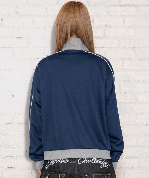 XTONZ(エクストーンズ)の「XJ140 スリムフィット アプリケ パイピング トラック ジップアップ (NAVY)(ナイロンジャケット・レディース・その他・MEDIUM/LARGE)」の9枚目の写真