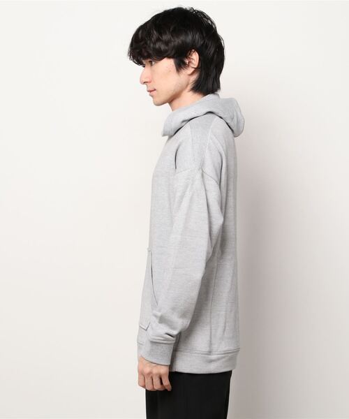 Reebok(リーボック)の「トレーニング エッセンシャルズ メランジ フーディー / Training Essentials Melange Hoodie(パーカー・メンズ・ブラック/ヘザーグレー・SMALL/MEDIUM/LARGE/X-LARGE/XX-LARGE/X-SMALL/XXX-LARGE)」の4枚目の写真