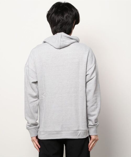 Reebok(リーボック)の「トレーニング エッセンシャルズ メランジ フーディー / Training Essentials Melange Hoodie(パーカー・メンズ・ブラック/ヘザーグレー・SMALL/MEDIUM/LARGE/X-LARGE/XX-LARGE/X-SMALL/XXX-LARGE)」の5枚目の写真