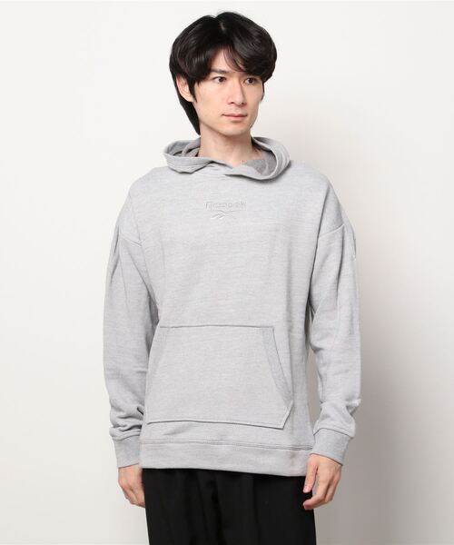 Reebok(リーボック)の「トレーニング エッセンシャルズ メランジ フーディー / Training Essentials Melange Hoodie(パーカー・メンズ・ブラック/ヘザーグレー・SMALL/MEDIUM/LARGE/X-LARGE/XX-LARGE/X-SMALL/XXX-LARGE)」の6枚目の写真