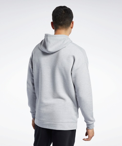 Reebok(リーボック)の「トレーニング エッセンシャルズ メランジ フーディー / Training Essentials Melange Hoodie(パーカー・メンズ・ブラック/ヘザーグレー・SMALL/MEDIUM/LARGE/X-LARGE/XX-LARGE/X-SMALL/XXX-LARGE)」の11枚目の写真