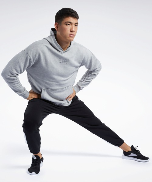 Reebok(リーボック)の「トレーニング エッセンシャルズ メランジ フーディー / Training Essentials Melange Hoodie(パーカー・メンズ・ブラック/ヘザーグレー・SMALL/MEDIUM/LARGE/X-LARGE/XX-LARGE/X-SMALL/XXX-LARGE)」の10枚目の写真