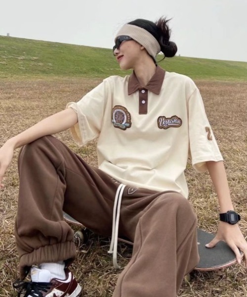 MGV（エムジーヴィー）の「バイカラーレトロワッペンポロ（ポロシャツ・レディース・ブラック/ベージュ・LARGE/MEDIUM/X-LARGE）」の7枚目の写真
