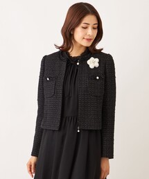 ニナリッチ　　リボン付き黒ノーカラージャケット パウダリーストレッチ黒 ノーカラージャケット セットアップ着用