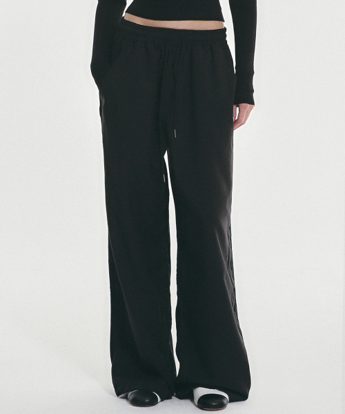 NICK&NICOLE(ニックアンドニコール)の「SIDE LINE STRING SLACKS_BLACK(スウェットパンツ・レディース・その他・FREE)」の1枚目の写真
