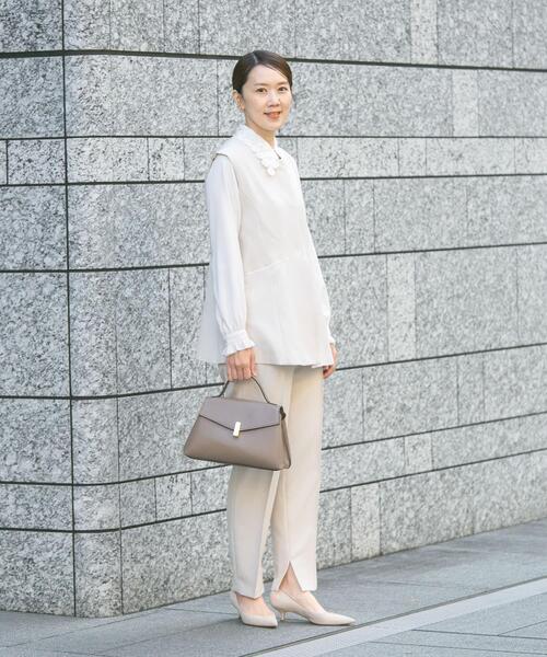 URBAN RESEARCH ROSSO WOMEN（アーバンリサーチ　ロッソ）の「『WEB/一部店舗限定』『SHORT/TALLサイズあり』ペプラムジレ+テーパードパンツ（セットアップ・レディース・ネイビー/ホワイト系その他/ブラック・38/SHORT/36/TALL）」の7枚目の写真