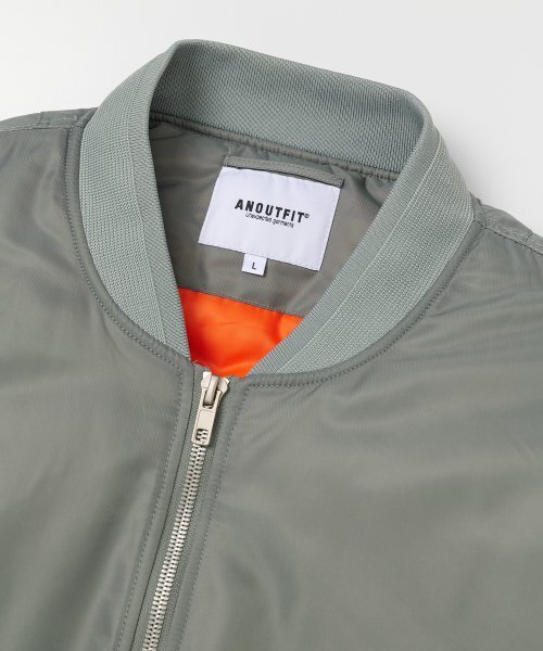 AOTT(アンアウトピット)の「ユニセックスオーバーフィットMA-1グレー(VER-2)(MA-1・レディース・グレー・S/M/L)」の4枚目の写真