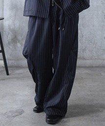 Confirm（コンファーム）の「スラックス スタッズ カーブパンツ メンズ レディース ユニセックス（スラックス）」