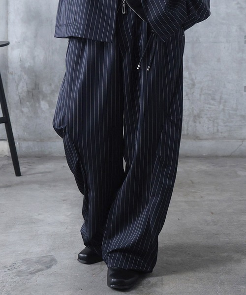 Confirm（コンファーム）の「AW スラックス スタッズ カーブパンツ メンズ レディース ユニセックス 【Confirm】（スラックス・メンズ・ブラック/ブラック系その他/パープル系その他/ブルー系その他・S/M/L）」の3枚目の写真