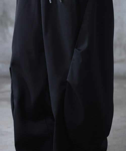 Confirm（コンファーム）の「AW スラックス スタッズ カーブパンツ メンズ レディース ユニセックス 【Confirm】（スラックス・メンズ・ブラック/ブラック系その他/パープル系その他/ブルー系その他・S/M/L）」の19枚目の写真