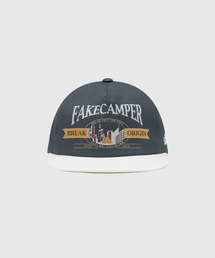 FAKE CAMPER（フェイクキャンパー）の「オールドタウングラフィックツートンスナップバック[NAVY]（キャップ）」