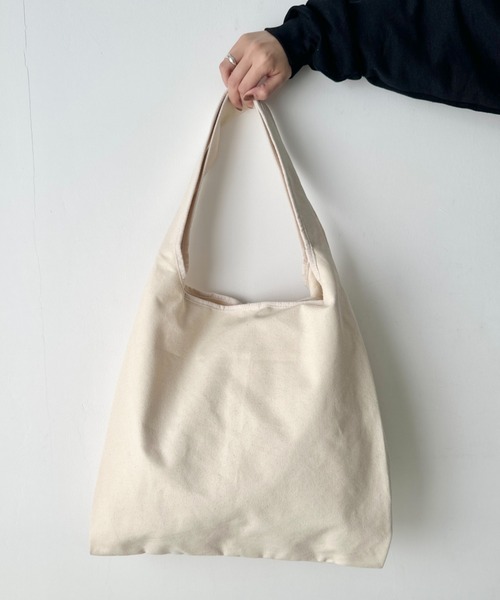 THE NORTH FACE(ザノースフェイス)の「THE NORTH FACE(ザ・ノースフェイス)/A4 PC収納可能 ビッグサイズ トートバッグ コットン生地 ロゴプリント/TNF TRIG BAG(トートバッグ・レディース・クリーム/ブラック・FREE)」の8枚目の写真
