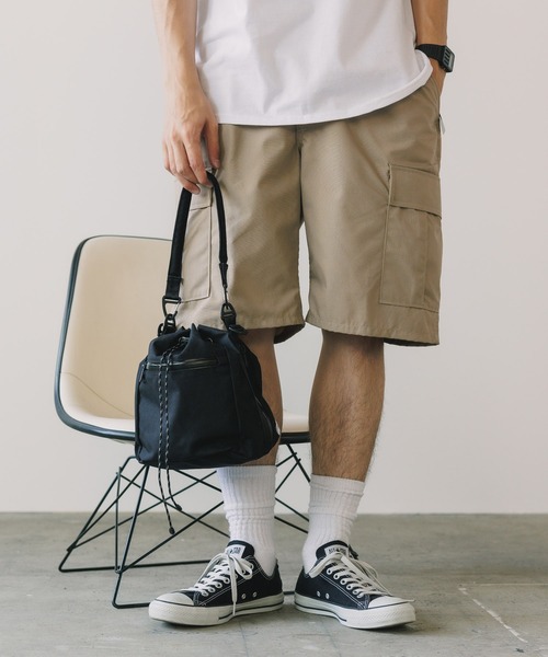 F/CE. （エフシーイー）の「F/CE./エフシーイー CORDURA FIRE RESISTANT DRAWSTRING BAG 巾着バック ナイロンバッグ（ショルダーバッグ・メンズ・ベージュ/グリーン/ブラック・FREE）」の2枚目の写真