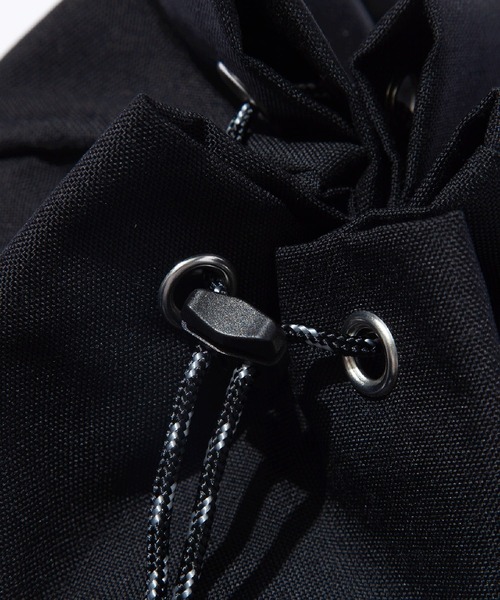 F/CE. （エフシーイー）の「F/CE./エフシーイー CORDURA FIRE RESISTANT DRAWSTRING BAG 巾着バック ナイロンバッグ（ショルダーバッグ・メンズ・ベージュ/グリーン/ブラック・FREE）」の6枚目の写真