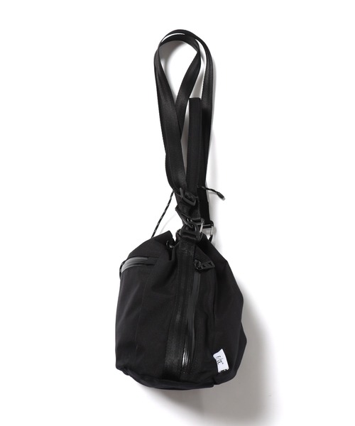 F/CE. （エフシーイー）の「F/CE./エフシーイー CORDURA FIRE RESISTANT DRAWSTRING BAG 巾着バック ナイロンバッグ（ショルダーバッグ・メンズ・ベージュ/グリーン/ブラック・FREE）」の12枚目の写真