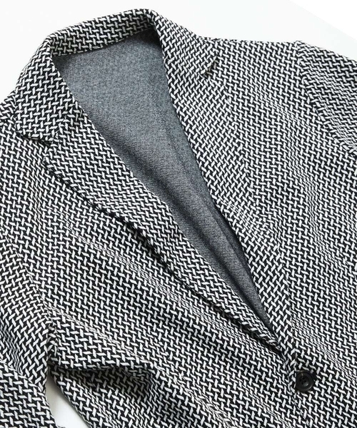 MK MICHEL KLEIN HOMME (エムケーミッシェルクランオム)の「【ラスト1/洗える 】フェザーへリンボンジャケット(テーラードジャケット・メンズ・ライトブラウン/ブラック・46/51/48)」の1枚目の写真