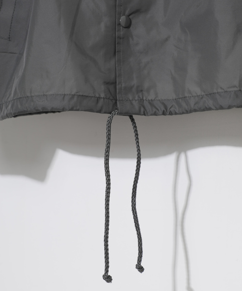 SWAGGER（スワッガー）の「【SWAGGER】別注SWGプリントオーバーサイズコーチジャケット（ナイロンジャケット・メンズ・ブラック/サンドグレー・MEDIUM/LARGE）」の11枚目の写真