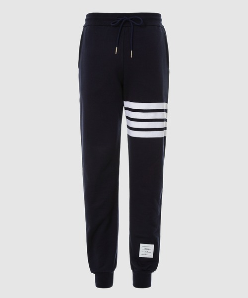 THOM BROWNE(トムブラウン)の「CLASSIC SWEATPANT WITH ENGINEERED 4-BAR IN CLASSIC LOOP BACK(スウェットパンツ・メンズ・ライトグレー/ネイビー・0/1/2)」の1枚目の写真