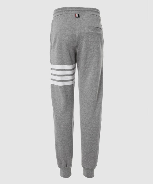 THOM BROWNE(トムブラウン)の「CLASSIC SWEATPANT WITH ENGINEERED 4-BAR IN CLASSIC LOOP BACK(スウェットパンツ・メンズ・ライトグレー/ネイビー・0/1/2)」の3枚目の写真