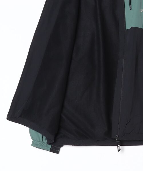 FILA（フィラ）の「【別注】フィラ FILA レディース裏トリコット起毛ウィンドジャケット 限定コラボ（ナイロンジャケット・レディース・スモークピンク/ダークグリーン/ネイビー・S/M/L/XL）」の4枚目の写真