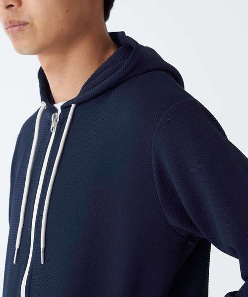 Blue Standard (ブルースタンダード)の「【BLUE STANDARD】ドライワッフルフルジップパーカー ツーマイル/ルームウェアとしてもおすすめ 制菌/防臭加工 速乾性 ストレッチ素材 セットアップ対応品番(パーカー・メンズ・ブラック/ネイビー/杢グレー・MEDIUM/LARGE/X-LARGE)」の21枚目の写真