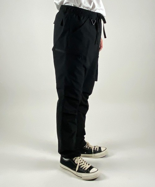 NUMBER (N)INE(ナンバーナイン)の「TAPERED ASYMMETRIC POCKET DRAWSTRING CARGO TROUSERS / アシンメトリックポケット テーパードカーゴパンツ(カーゴパンツ・メンズ・ブラック/オリーブ・2/4/3)」の5枚目の写真