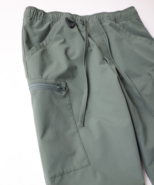 NUMBER (N)INE(ナンバーナイン)の「TAPERED ASYMMETRIC POCKET DRAWSTRING CARGO TROUSERS / アシンメトリックポケット テーパードカーゴパンツ(カーゴパンツ・メンズ・ブラック/オリーブ・2/4/3)」の19枚目の写真