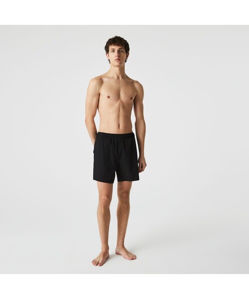 LACOSTE(ラコステ)の「ワントーンスイムショーツ(水着・メンズ・ブラック/ロイヤルブルー・M/L)」の1枚目の写真