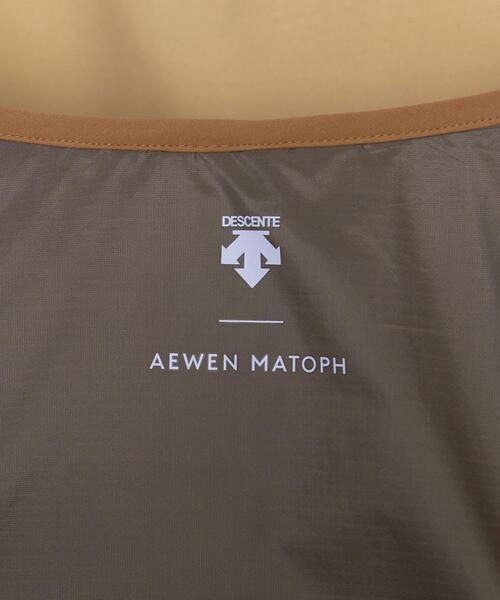 DESCENTE（デサント）の「別注＜DESCENTE ddd ＞ ノーカラーコート（ノーカラーコート・レディース・ブラック/オレンジ・SMALL/MEDIUM）」の21枚目の写真