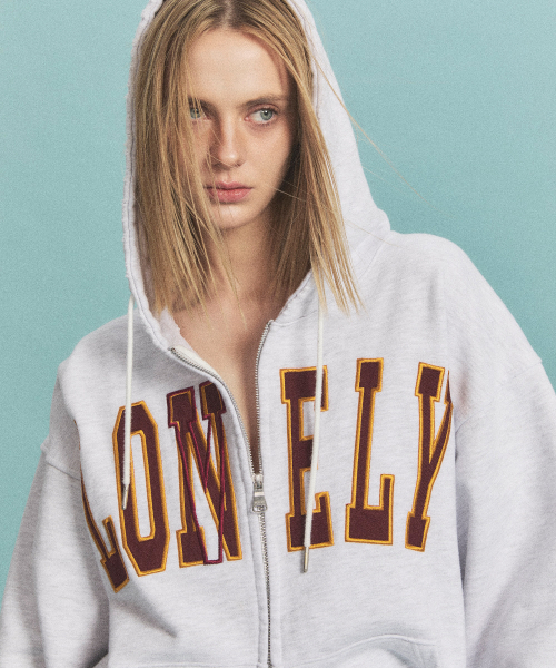 NOHANT(ノアン)の「LONELY/LOVELY SALT WASHING HOODIE ZIP-UP ASH GRAY(パーカー・レディース・ライトグレー・LARGE/SMALL/MEDIUM)」の2枚目の写真