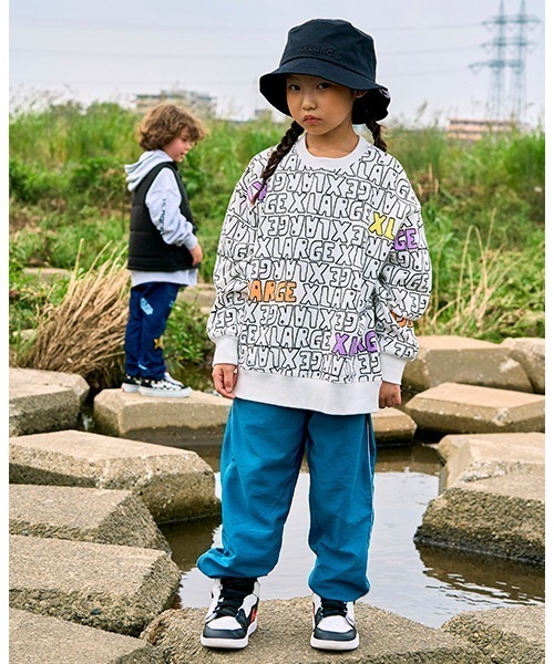 XLARGE KIDS（エクストララージキッズ）の「手書き風ロゴ総柄ロゴ