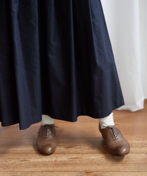 Lene（レネ）の「ミクロモールスキン　タックスカート（スカート・レディース・ネイビー/アイボリー・FREE）」の6枚目の写真