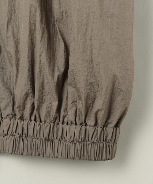 ASTRAET（アストラット）の「＜ASTRAET（アストラット）＞スソゴム スタンドカラー ナイロンブルゾン（ナイロンジャケット・レディース・ブラック/モカ・FREE）」の10枚目の写真