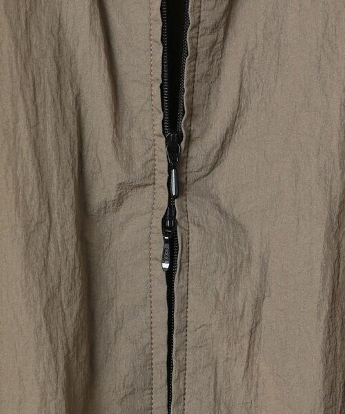 ASTRAET（アストラット）の「＜ASTRAET（アストラット）＞スソゴム スタンドカラー ナイロンブルゾン（ナイロンジャケット・レディース・ブラック/モカ・FREE）」の12枚目の写真