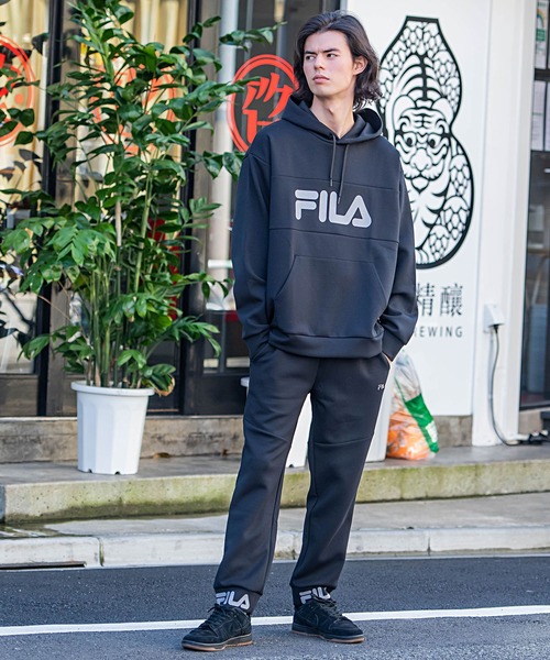 FILA(フィラ)の「『FILA/フィラ』ロゴプリントストレッチプルパーカー(パーカー・メンズ・ブラック/ネイビー/カーキ・M/L)」の8枚目の写真