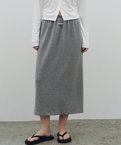 NEEV(ニーヴ)の「Smoke Banding Long Skirt (Melange Grey)(スカート・レディース・その他・FREE)」の1枚目の写真