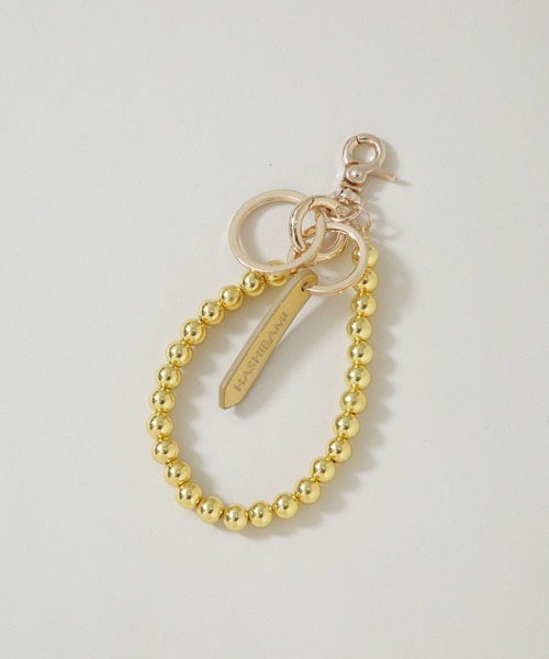 HASHIBAMI（ハシバミ）の「HASHIBAMI/ヘマタイト 丸玉 スマホハンドストラップ（スマホグッズ・レディース・シルバー/ゴールド・FREE）」の2枚目の写真