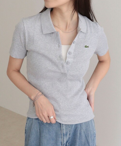 fredy emue（フレディエミュ）の「【LACOSTE/ラコステ】ワンポイントリブポロシャツ（ポロシャツ・レディース・オフホワイト/ブラック/ライトグレー・38）」の3枚目の写真