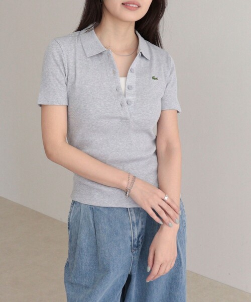 fredy emue（フレディエミュ）の「【LACOSTE/ラコステ】ワンポイントリブポロシャツ（ポロシャツ・レディース・オフホワイト/ブラック/ライトグレー・38）」の9枚目の写真